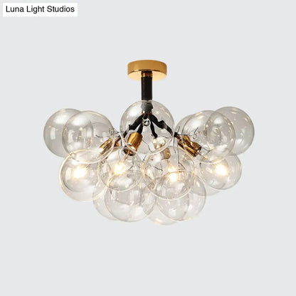 Brass Black Bubble Light chandelier by Decorbites with clear glass globes on Tampa Home & Garden Store