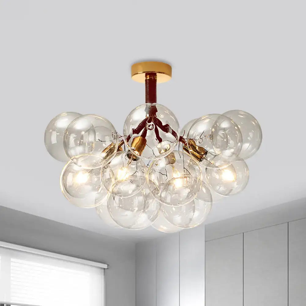 Decorbites Brass Black Bubble Light chandelier with clear glass globe bulbs on Tampa Home & Garden Store