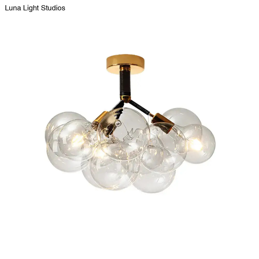 Brass Black Bubble Light pendant with clear glass globes by Decorbites on Tampa Home & Garden Store
