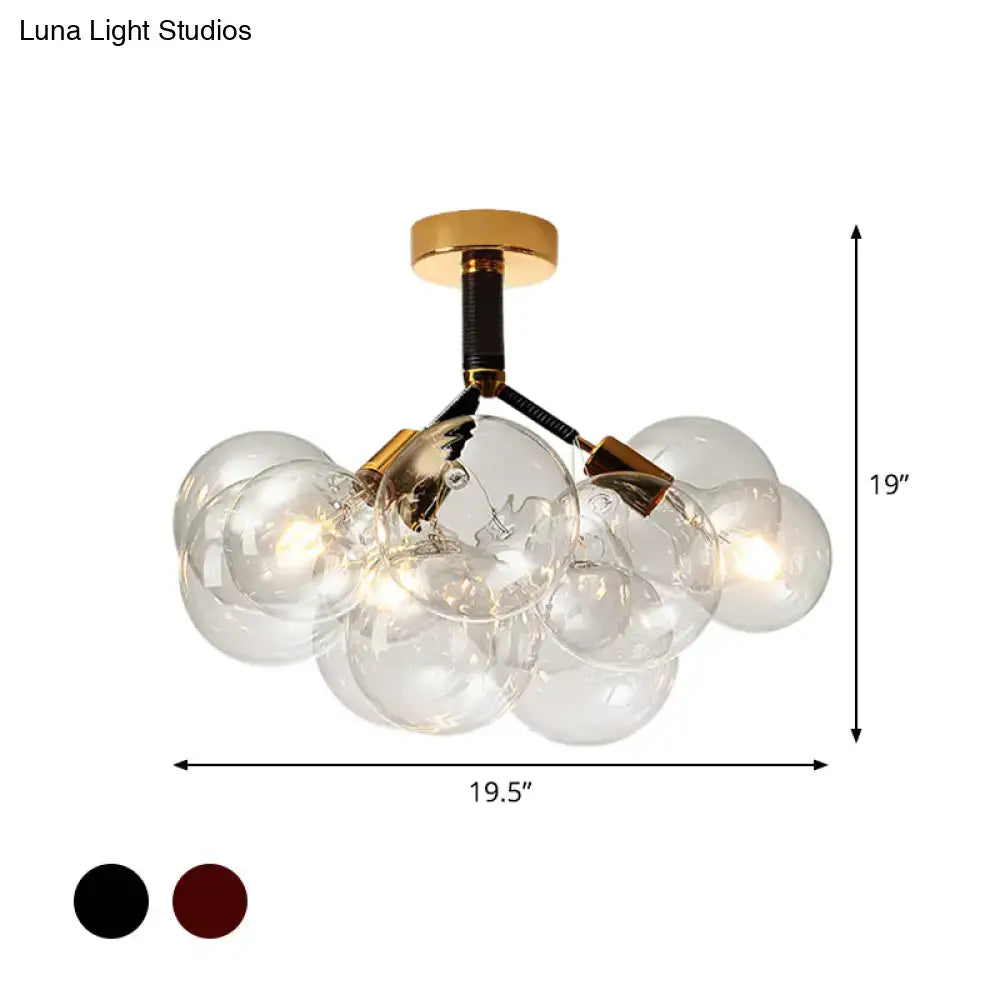 Brass Black Bubble Light chandelier with clear glass globes and black cord accents by Decorbites on Tampa Home & Garden Store