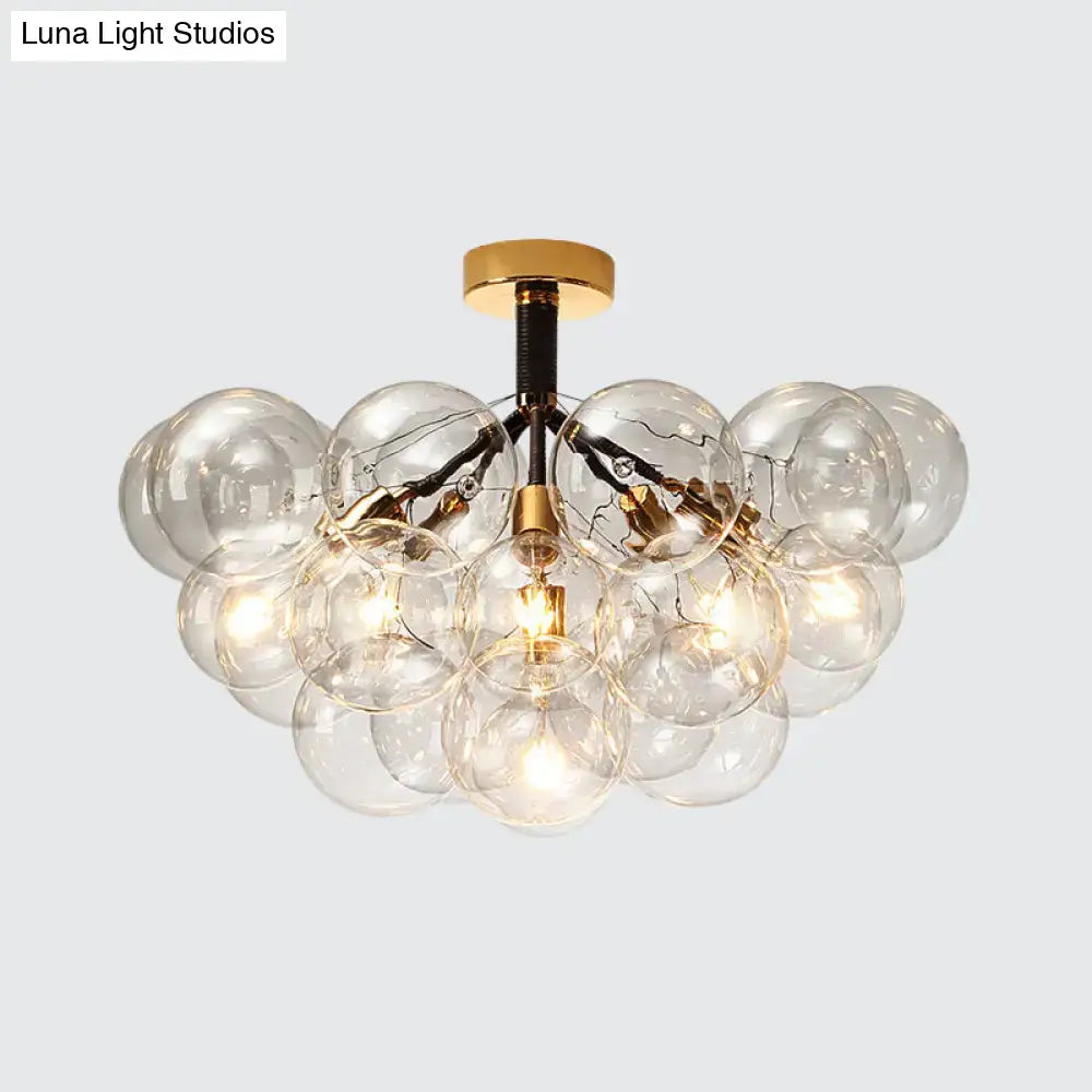 Brass Black Bubble Light chandelier with clear glass globe bulbs by Decorbites on Tampa Home & Garden Store