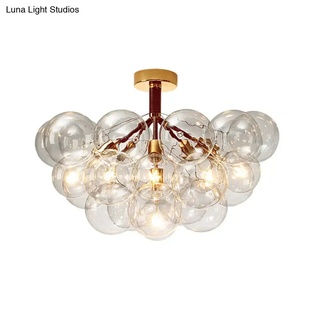 Brass Black Bubble Light chandelier with a cluster of clear glass globes, Decorbites on Tampa Home & Garden Store
