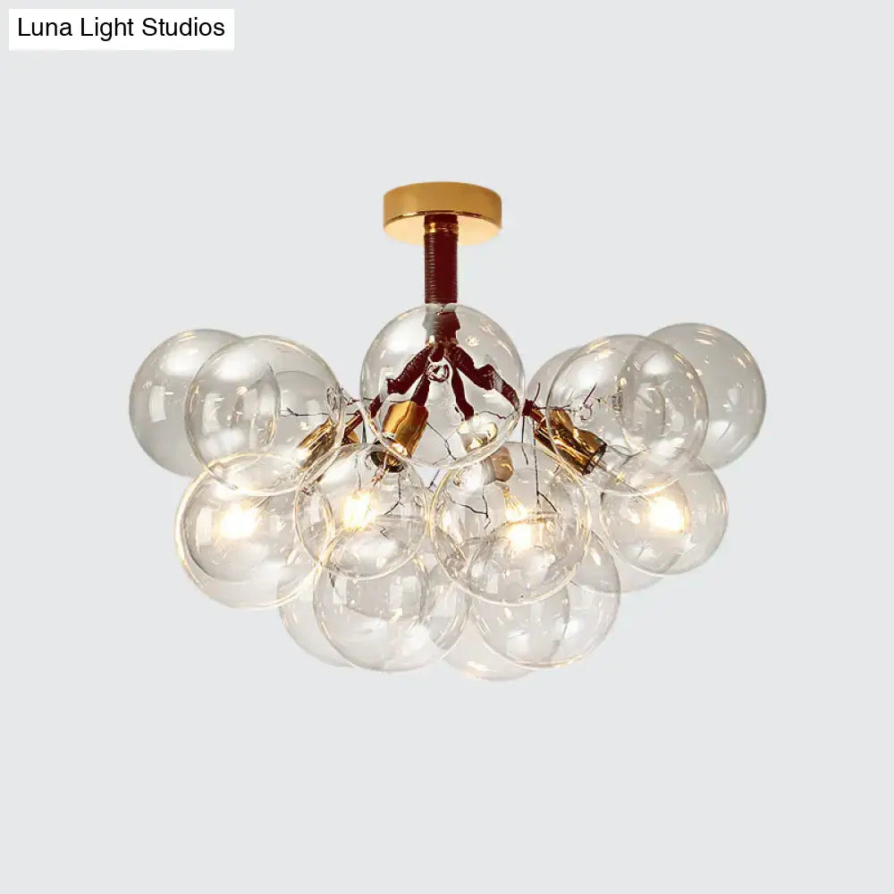 Decorbites Brass Black Bubble Light chandelier with clear glass globes on Tampa Home & Garden Store