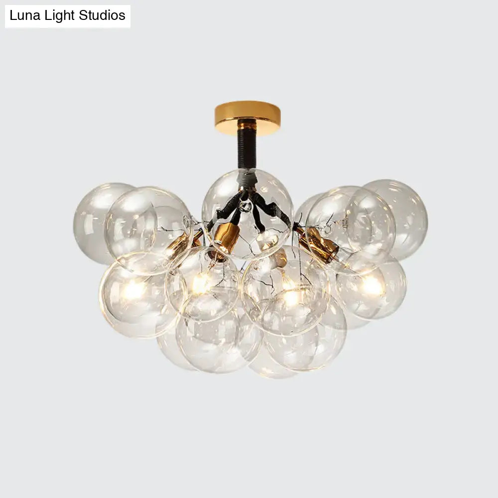 Brass Black Bubble Light chandelier by Decorbites; clear glass globe cluster on Tampa Home & Garden Store