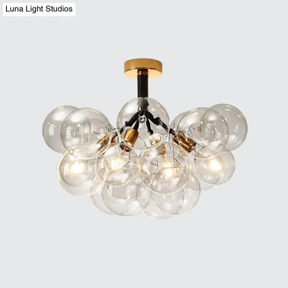 Brass Black Bubble Light chandelier by Decorbites; clear glass globe cluster on Tampa Home & Garden Store