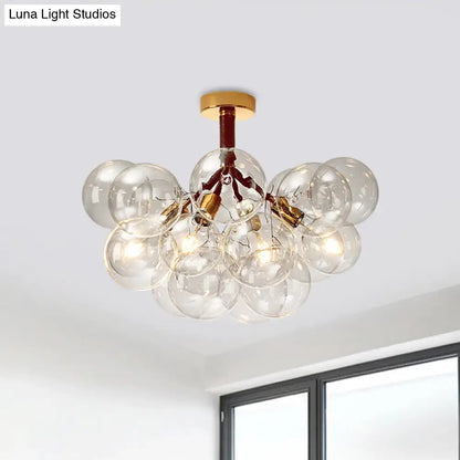 Brass Black Bubble Light chandelier with clear glass globes by Decorbites on Tampa Home & Garden Store