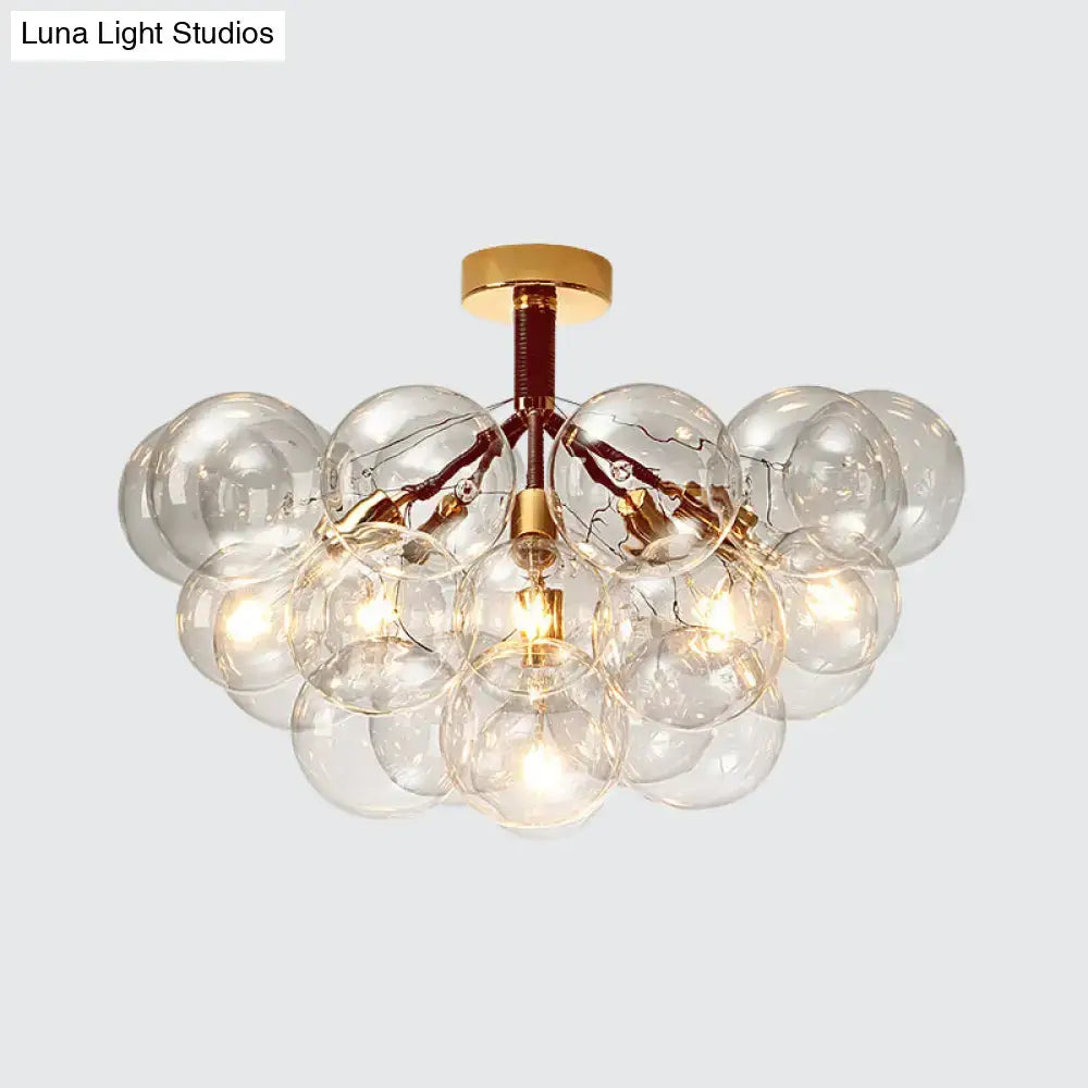 Brass Bubble Light chandelier with clear glass globes and gold hardware by Decorbites on Tampa Home & Garden Store