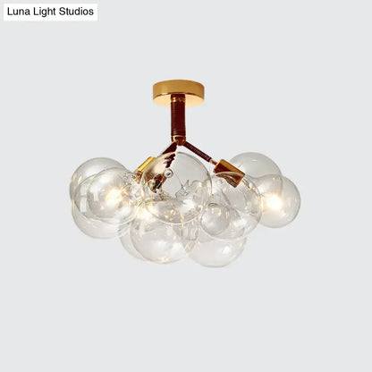 Brass Black Bubble Light ceiling fixture with a cluster of clear glass globes by Decorbites on Tampa Home & Garden Store