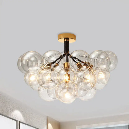 Brass Black Bubble Light ceiling fixture with clear glass globes and warm bulbs by Decorbites on Tampa Home & Garden Store