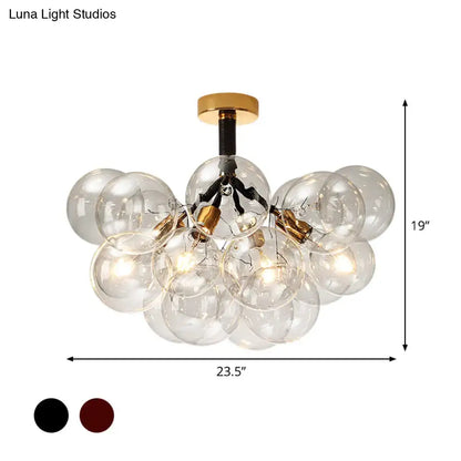 Brass Black Bubble Light chandelier by Decorbites with clear glass globes and black hardware on Tampa Home & Garden Store