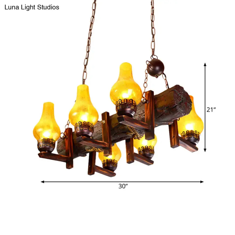 Yellow crackle-glass chandelier with five amber lamps on a rustic wooden beam by Decorbites on Tampa Home & Garden Store