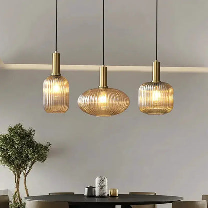 Retro amber ribbed glass pendant lights (set of 3) by Decorbites with brass hardware on Tampa Home & Garden Store