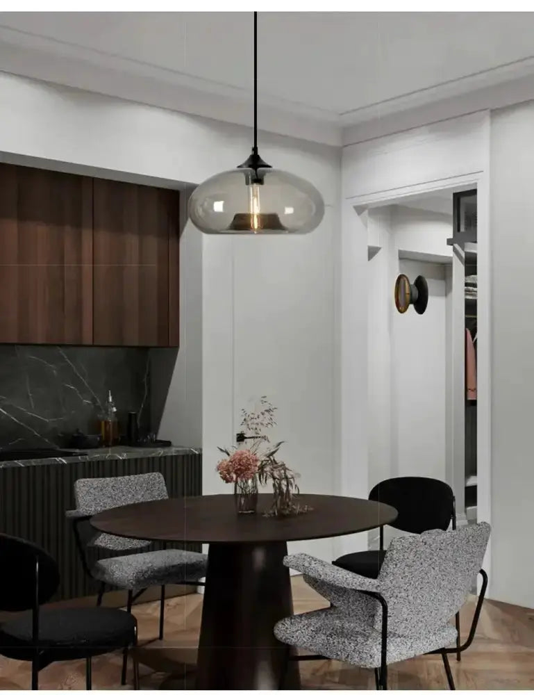 Pendant light Decorbites modern amber & smoky gray glass LED pendant over dining table on Tampa Home & Garden Store