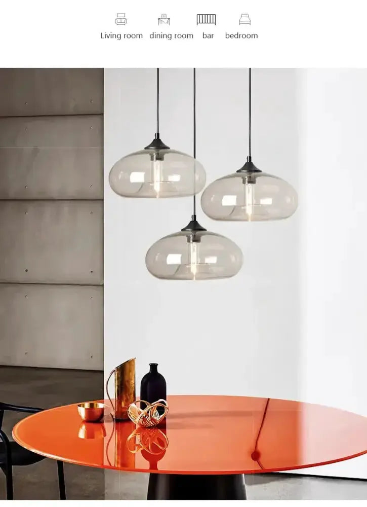 Pendant lights by Decorbites: three amber smoky gray glass LED pendants for the dining room on Tampa Home & Garden Store