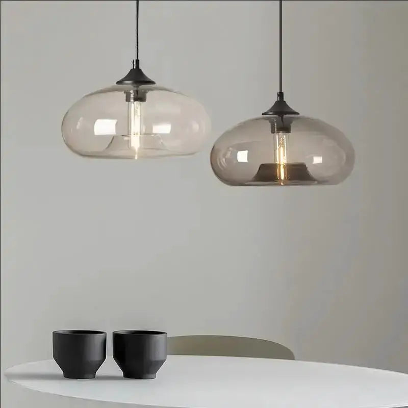 Pendant lights: two modern amber and smoky gray glass LED fixtures by Decorbites on Tampa Home & Garden Store