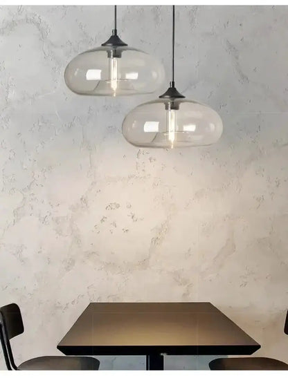 Decorbites amber & smoky gray glass LED pendant lights, pair over dining table on Tampa Home & Garden Store