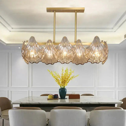 Contemporary amber crystal brass island dining chandelier by Decorbites with ribbed shells on Tampa Home & Garden Store