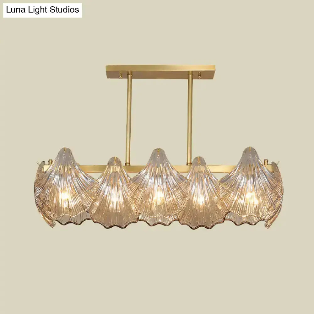 Contemporary amber crystal brass island chandelier with five glass shell shades on Tampa Home & Garden Store
