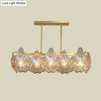 Contemporary amber crystal brass island chandelier with five glass shell shades on Tampa Home & Garden Store