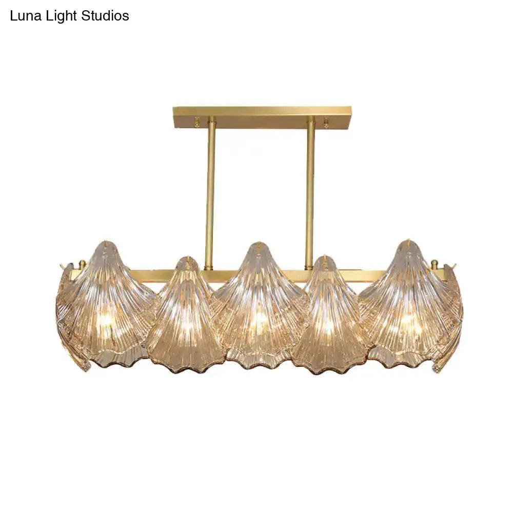Contemporary amber crystal brass island dining chandelier with five shell glass shades on Tampa Home & Garden Store