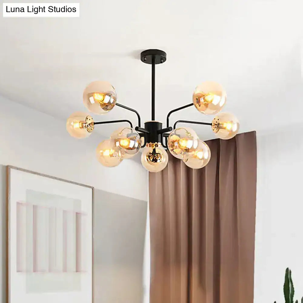 Black amber glass chandelier with energy-efficient globe lights on black metal arms on Tampa Home & Garden Store