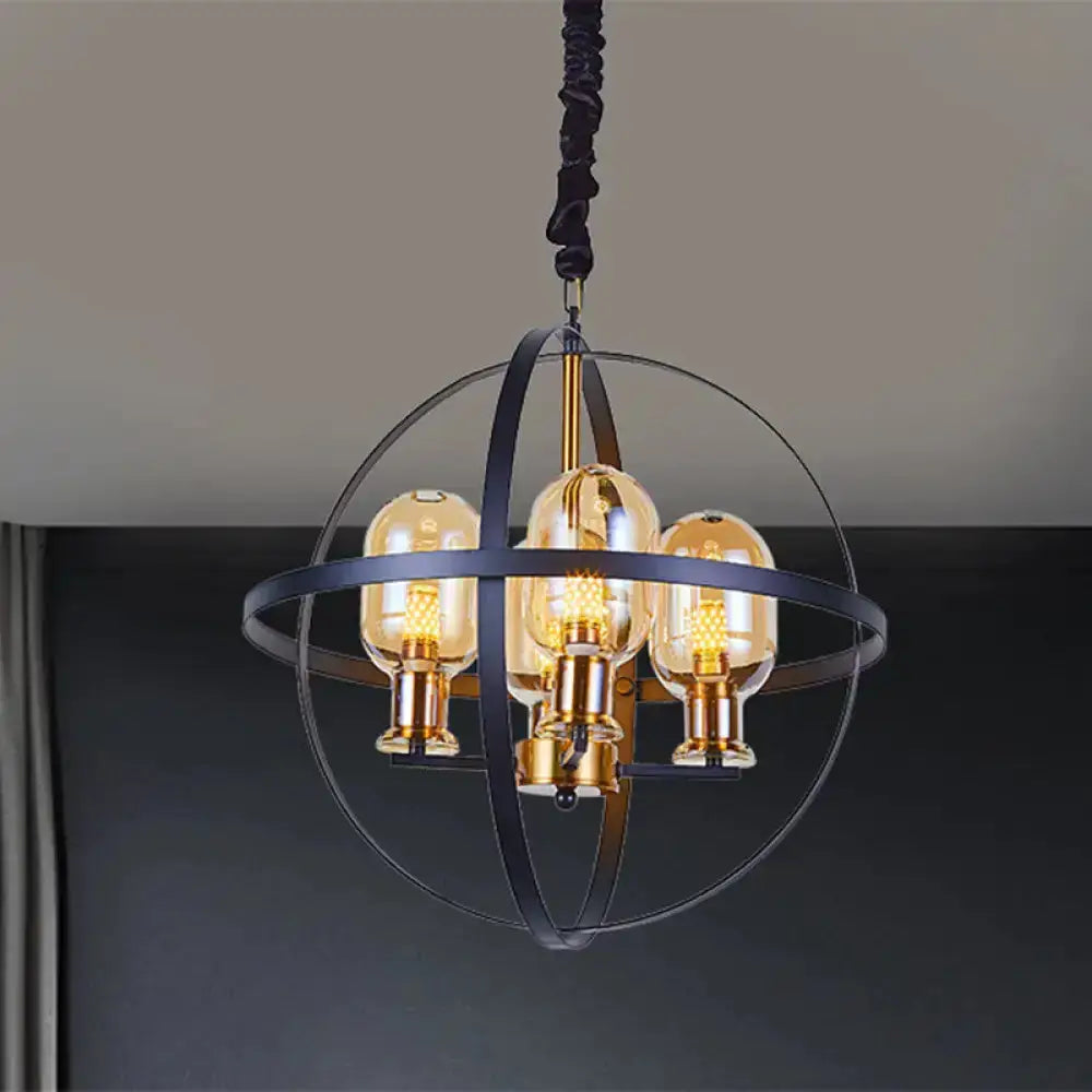 Industrial amber glass pendant chandelier with brass finish and spherical metal frame on Tampa Home & Garden Store