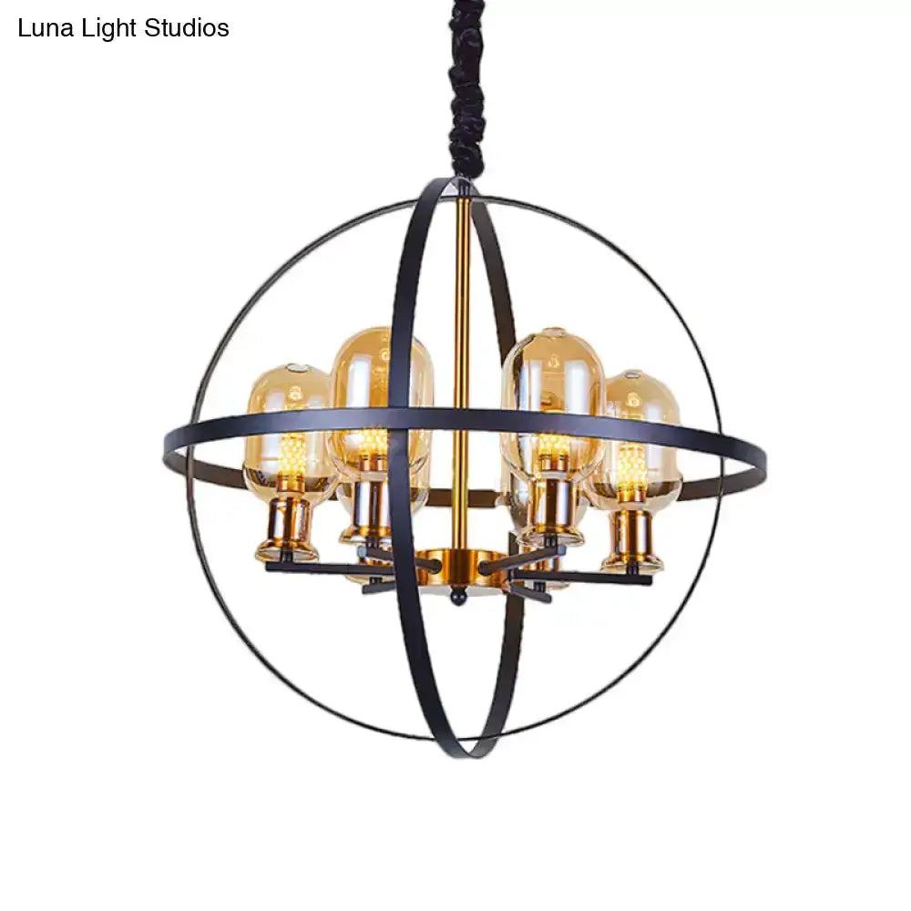 Industrial amber glass pendant chandelier with brass finish and black metal orb, six bulbs on Tampa Home & Garden Store