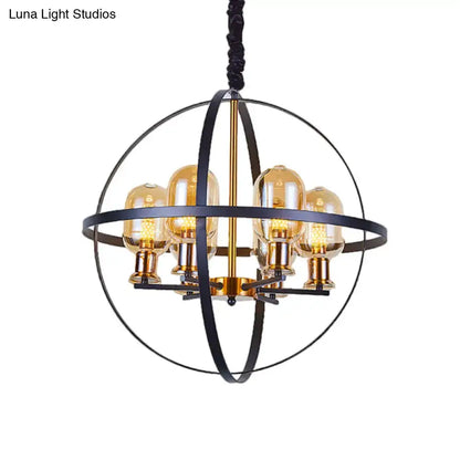 Industrial amber glass pendant chandelier with brass finish and black metal orb, six bulbs on Tampa Home & Garden Store