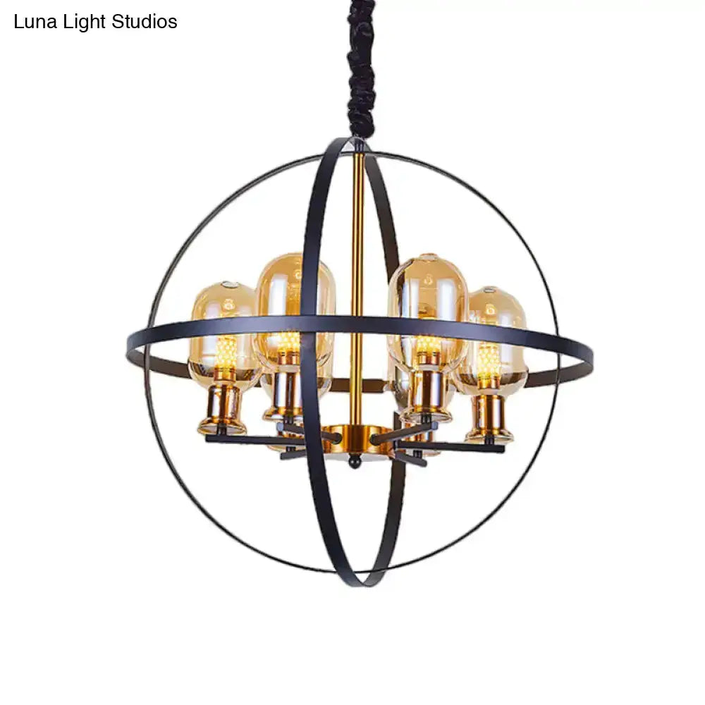 Industrial amber glass pendant chandelier with brass finish and orbital rings on Tampa Home & Garden Store