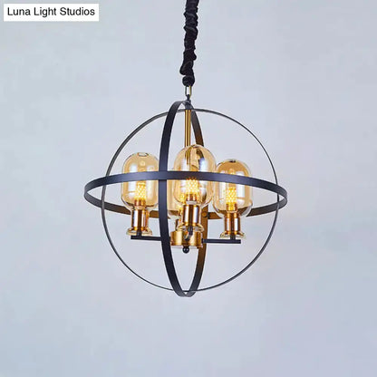 Industrial amber glass pendant chandelier with brass finish and circular metal rings Decorbites on Tampa Home & Garden Store