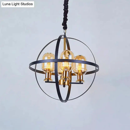 Amber glass pendant chandelier with brass in black armillary sphere, four bulbs Decorbites on Tampa Home & Garden Store