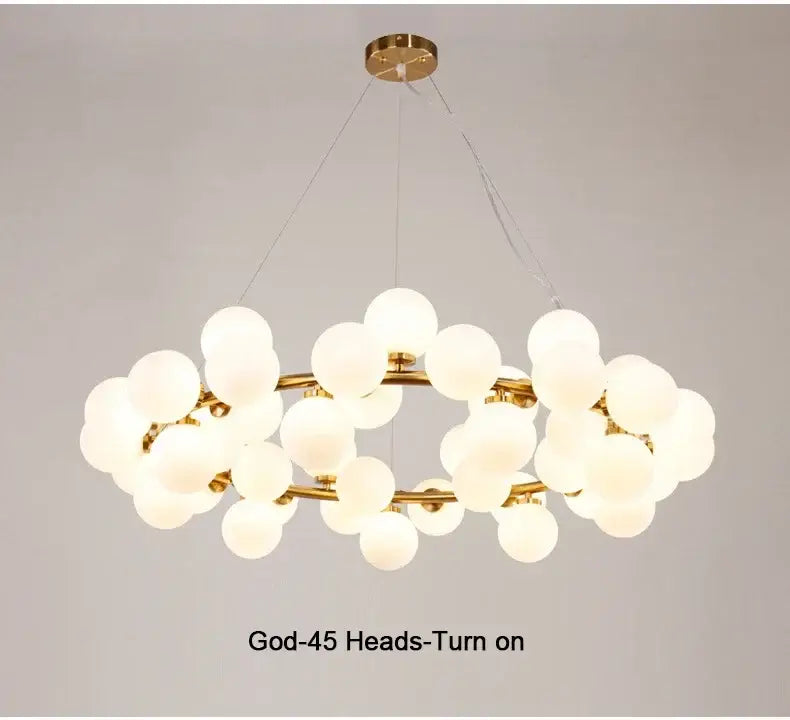 Black Gold Glass Ball Chandelier with gold rings and frosted glass globes in clusters on Tampa Home & Garden Store