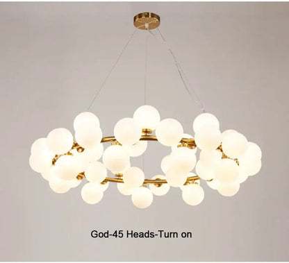 Black Gold Glass Ball Chandelier with gold rings and frosted glass globes in clusters on Tampa Home & Garden Store