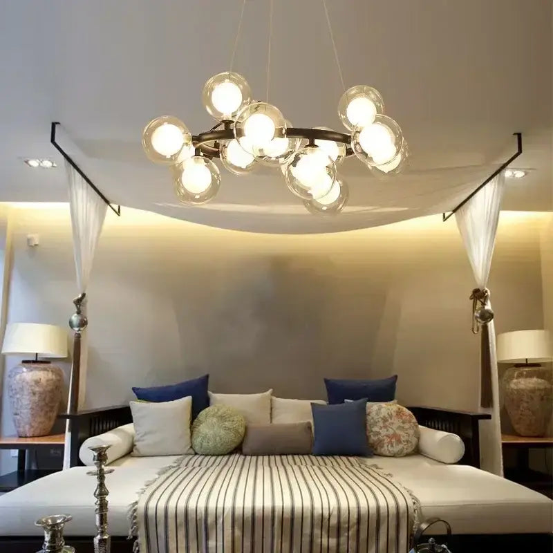 Black Gold Glass Ball Chandelier by Decorbites with multiple glass globe bulbs on Tampa Home & Garden Store
