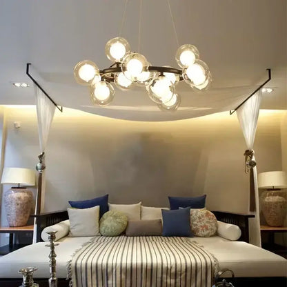 Black Gold Glass Ball Chandelier by Decorbites with multiple glass globe bulbs on Tampa Home & Garden Store