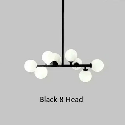 Decorbites Black Gold Glass Ball Chandelier with eight white globes on a black metal frame on Tampa Home & Garden Store