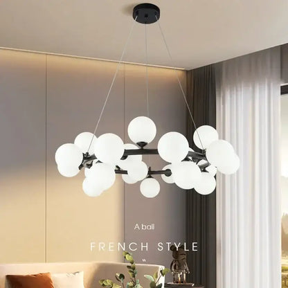 Black Gold Glass Ball Chandelier by Decorbites with frosted spheres on metal arms on Tampa Home & Garden Store