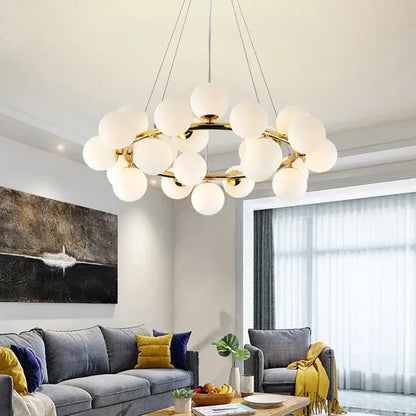 Black Gold Glass Ball Chandelier by Decorbites with gold ring and white glass globes on Tampa Home & Garden Store