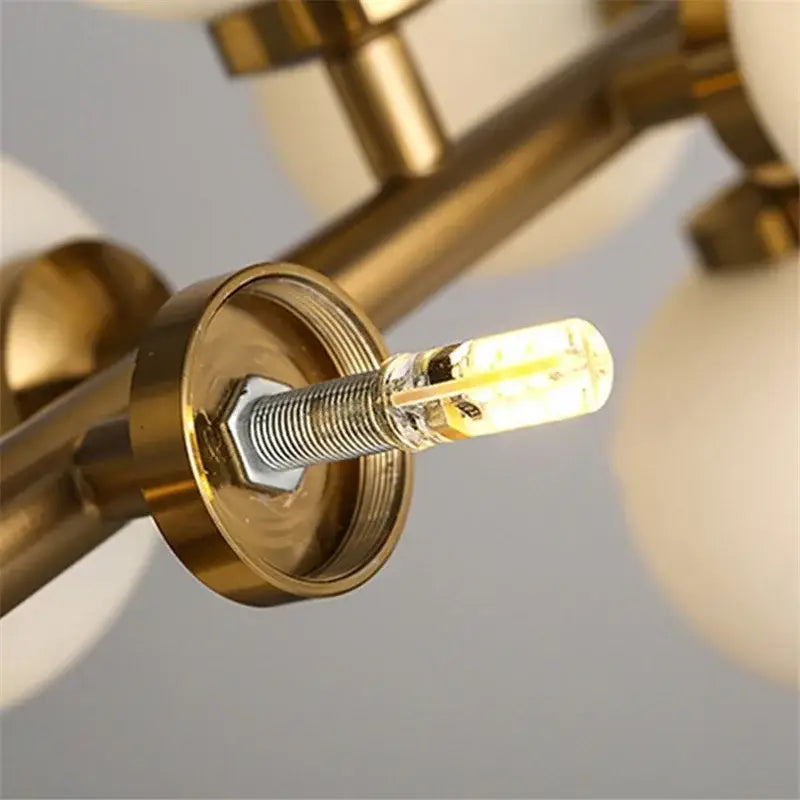 Black Gold Glass Ball Chandelier arm with brass mount and clear filament bulb by Decorbites on Tampa Home & Garden Store