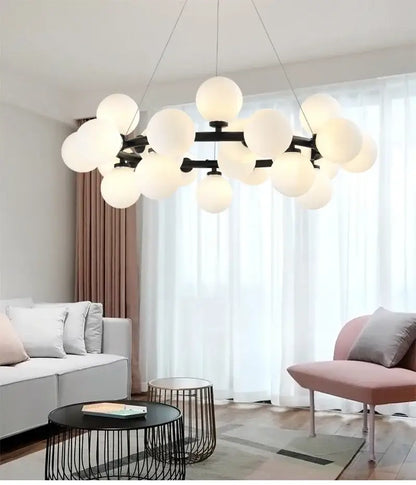 Black Gold Glass Ball Chandelier by Decorbites, black metal frame with white glass globes on Tampa Home & Garden Store