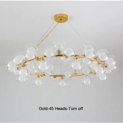 Black Gold Glass Ball Chandelier by Decorbites with gold ring and clear glass globes on Tampa Home & Garden Store