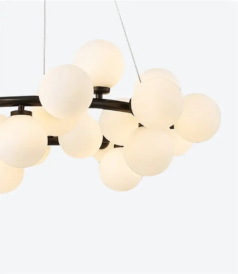 Black Gold Glass Ball Chandelier by Decorbites with frosted glass globe cluster black metal frame on Tampa Home & Garden Store