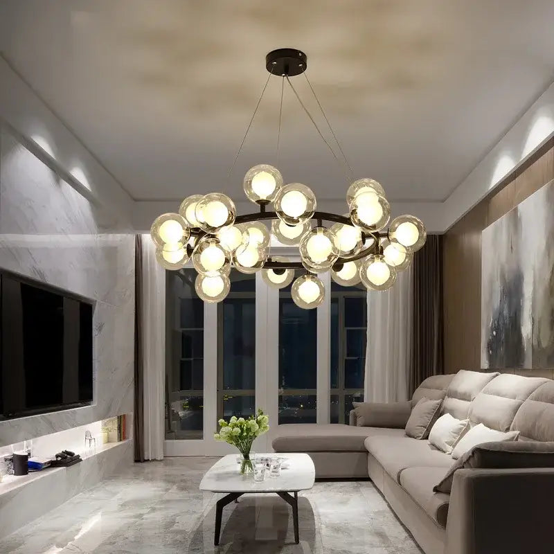 Black Gold Glass Ball Chandelier by Decorbites with glass globe cluster on a dark metal frame on Tampa Home & Garden Store
