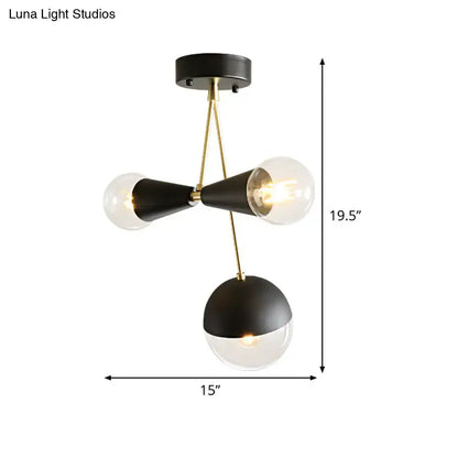 Black glass flush mount light by Decorbites, brass accents, three-globe cluster on Tampa Home & Garden Store