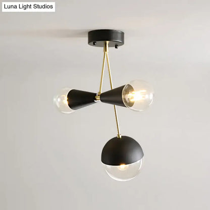 Black Glass Flush Mount ceiling light Decorbites with gold accents and three glass globes on Tampa Home & Garden Store