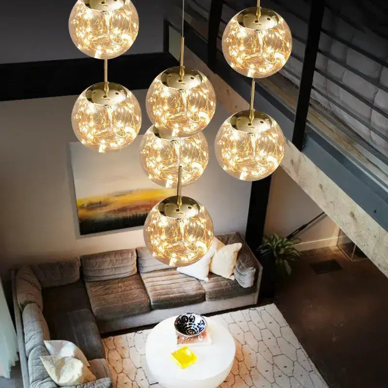 Modern spiral crystal ball chandelier with six warm glass globe pendants by Decorbites on Tampa Home & Garden Store