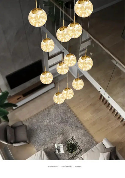 Decorbites modern spiral crystal ball chandelier with hanging orb pendants and warm LED glow on Tampa Home & Garden Store