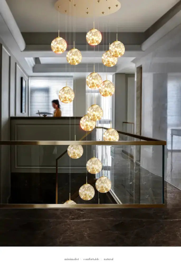 Chandelier Decorbites spiral crystal ball pendant light with gold cables and glass orbs on Tampa Home & Garden Store