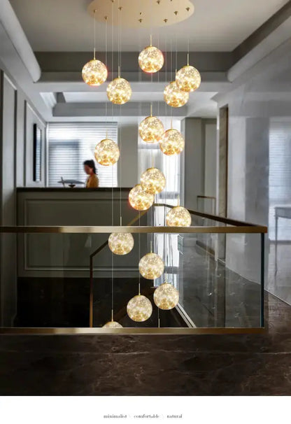 Chandelier Decorbites spiral crystal ball pendant light with gold cables and glass orbs on Tampa Home & Garden Store