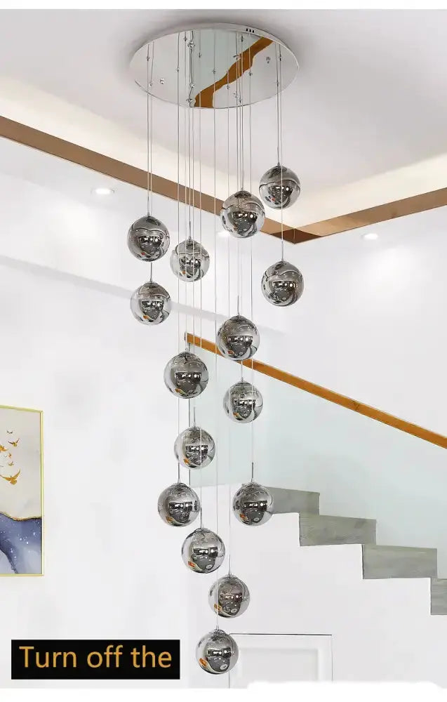 Decorbites modern spiral crystal ball chandelier with cascading chrome glass spheres on Tampa Home & Garden Store